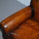 Two-seater canapé in aged leather, Victorian style.