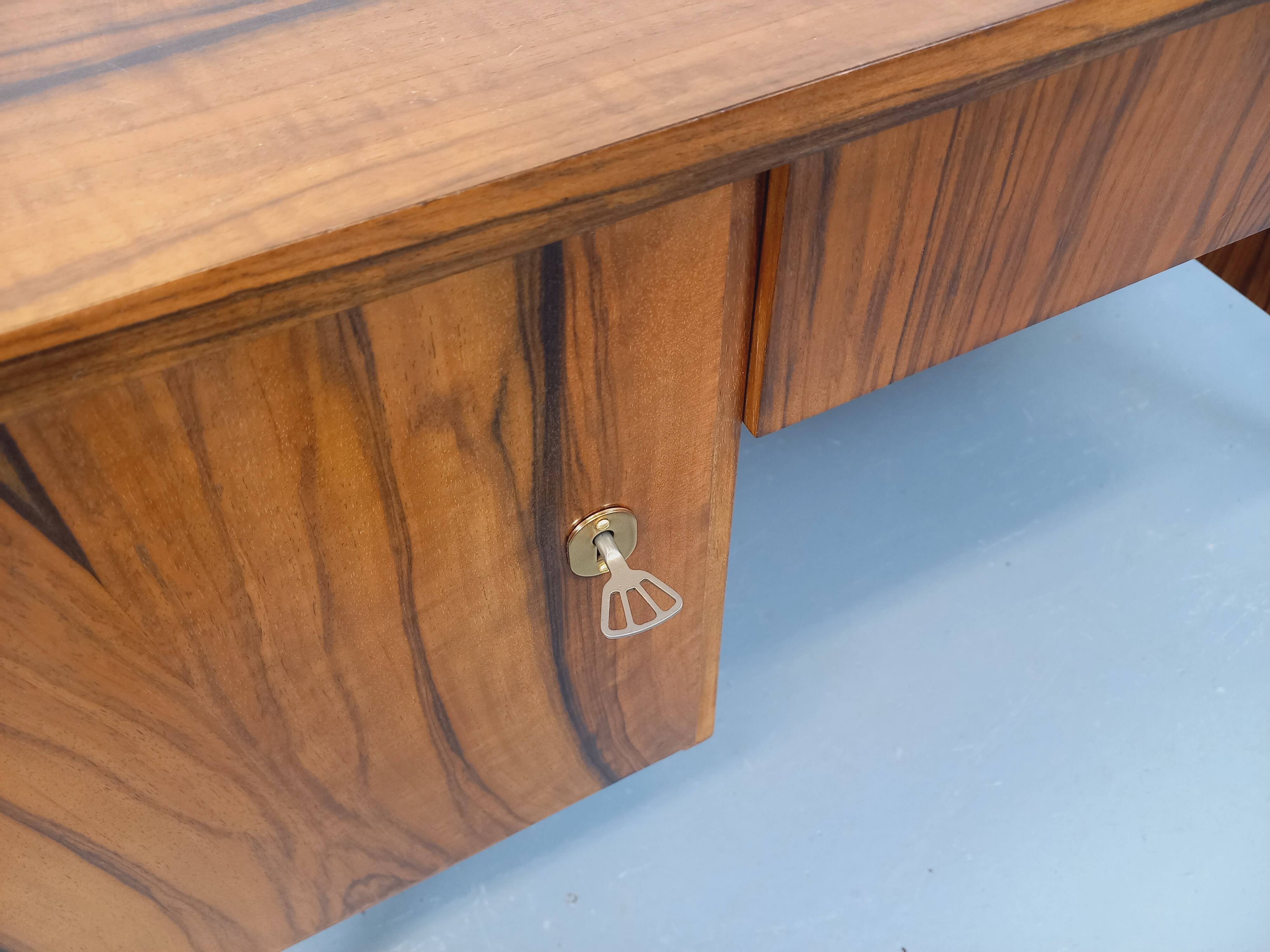Double-sided executive desk in vintage Scandinavian style made of rosewood.