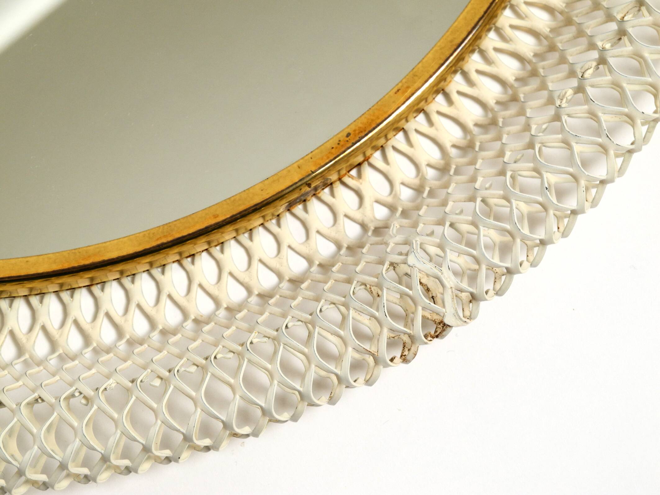 Pair of Mid Century wall mirrors with brass rim and white metal frames