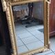 Antique mirror in wood and gilded stucco, neo Louis XVI style.