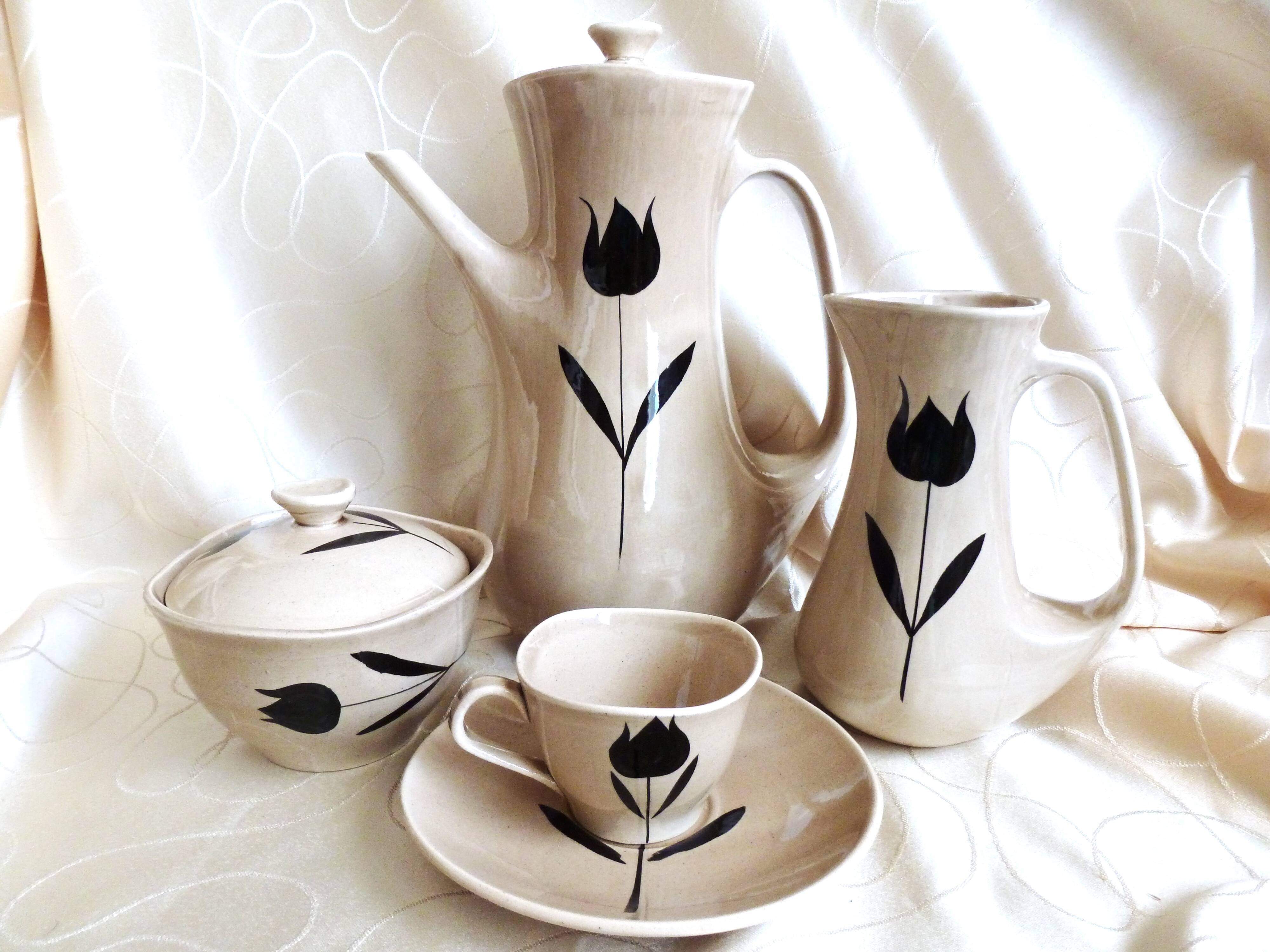 Vintage 23-piece Niderviller coffee set with hand-painted black tulip decor.
