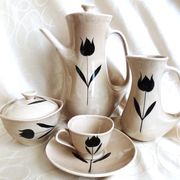 Vintage 23-piece Niderviller coffee set with hand-painted black tulip decor.