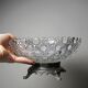 Pressed glass coupe with diamond points, antique from 1920-1950 on a pewter base.