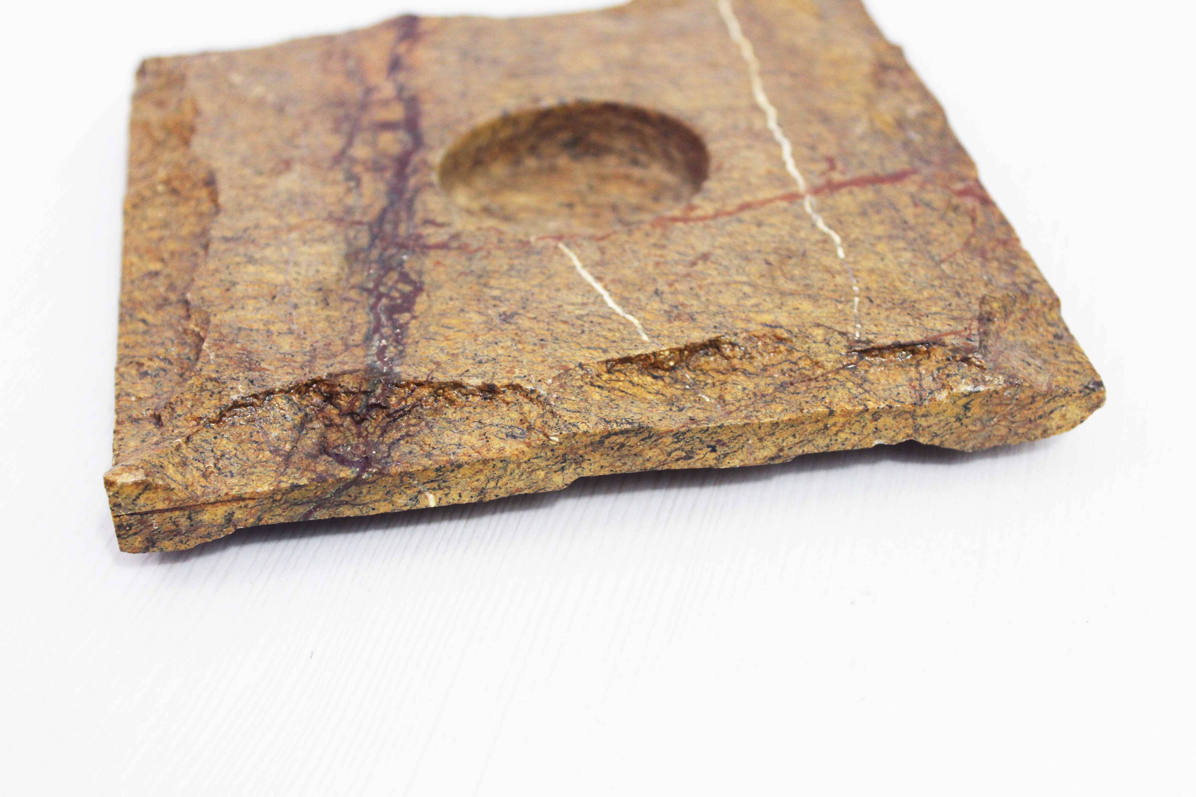 Pair of travertine candlesticks