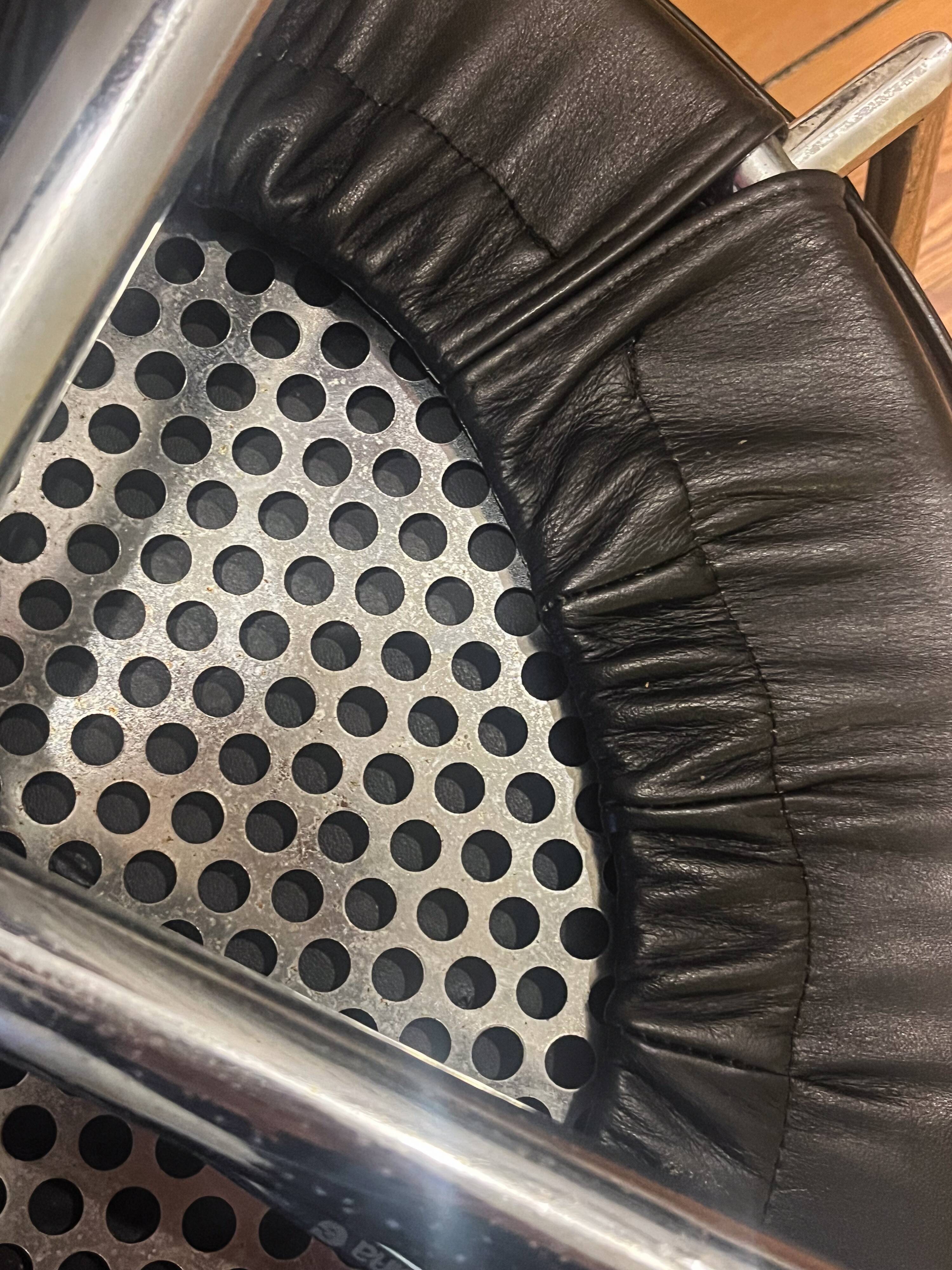 La Corbusier, Pair of LC7 armchairs, Cassina edition