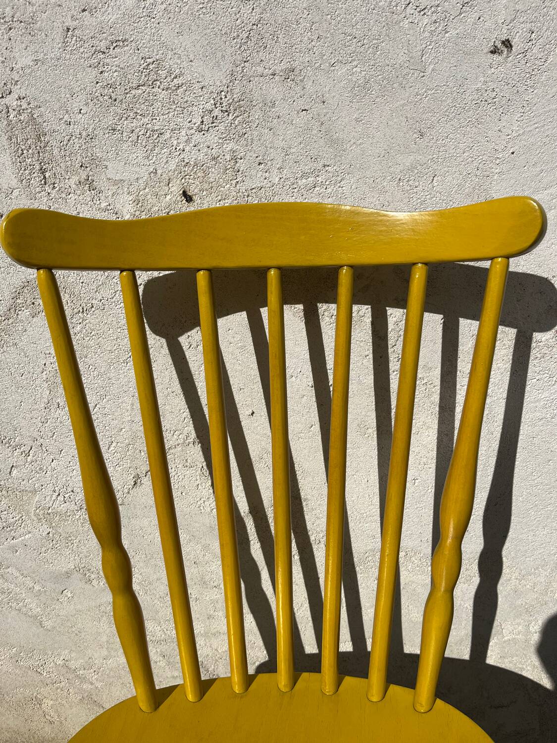 Mustard yellow Baumann chair