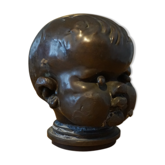 Bronze child's head of the early 20th