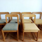 Six Scandinavian style chairs in elm and fabric.