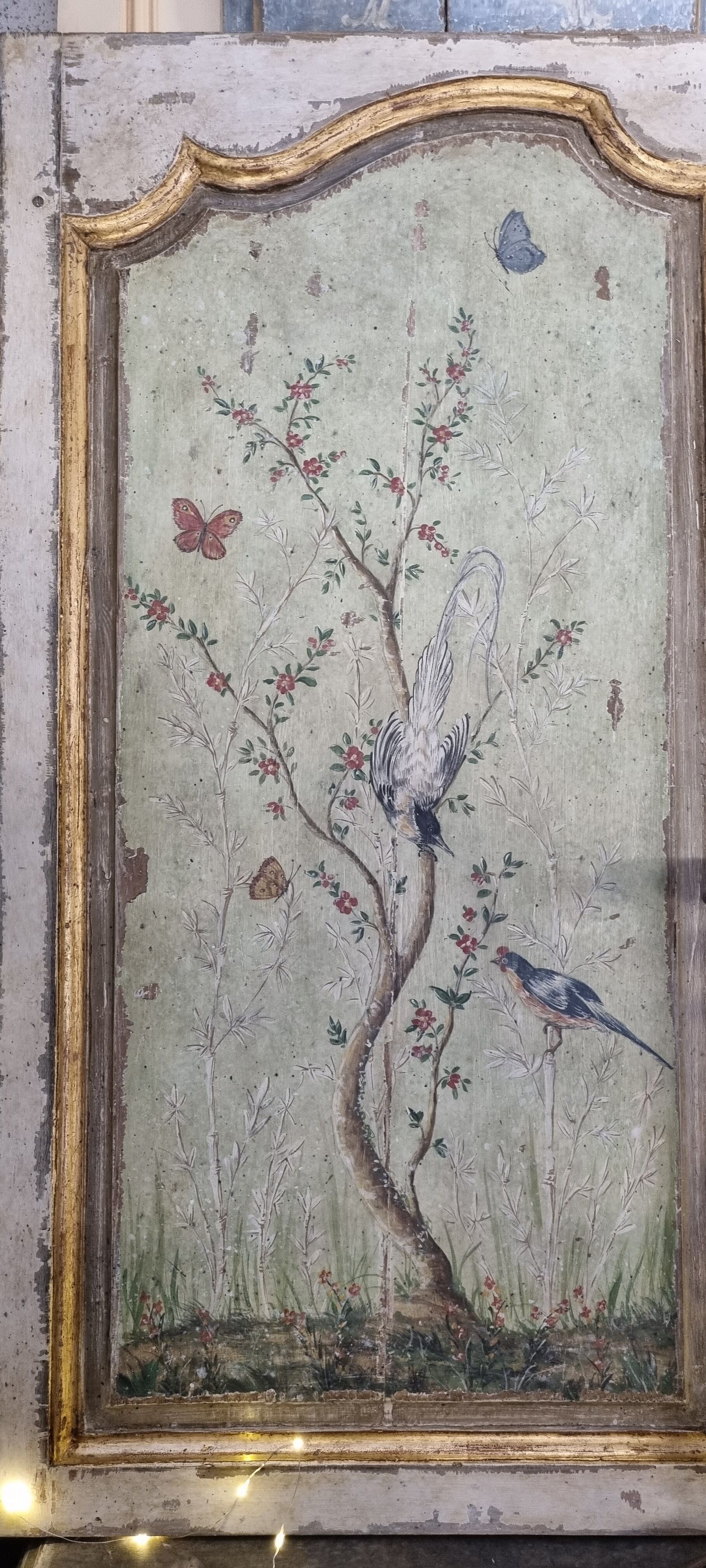 Pair of 18th painted panels and décor