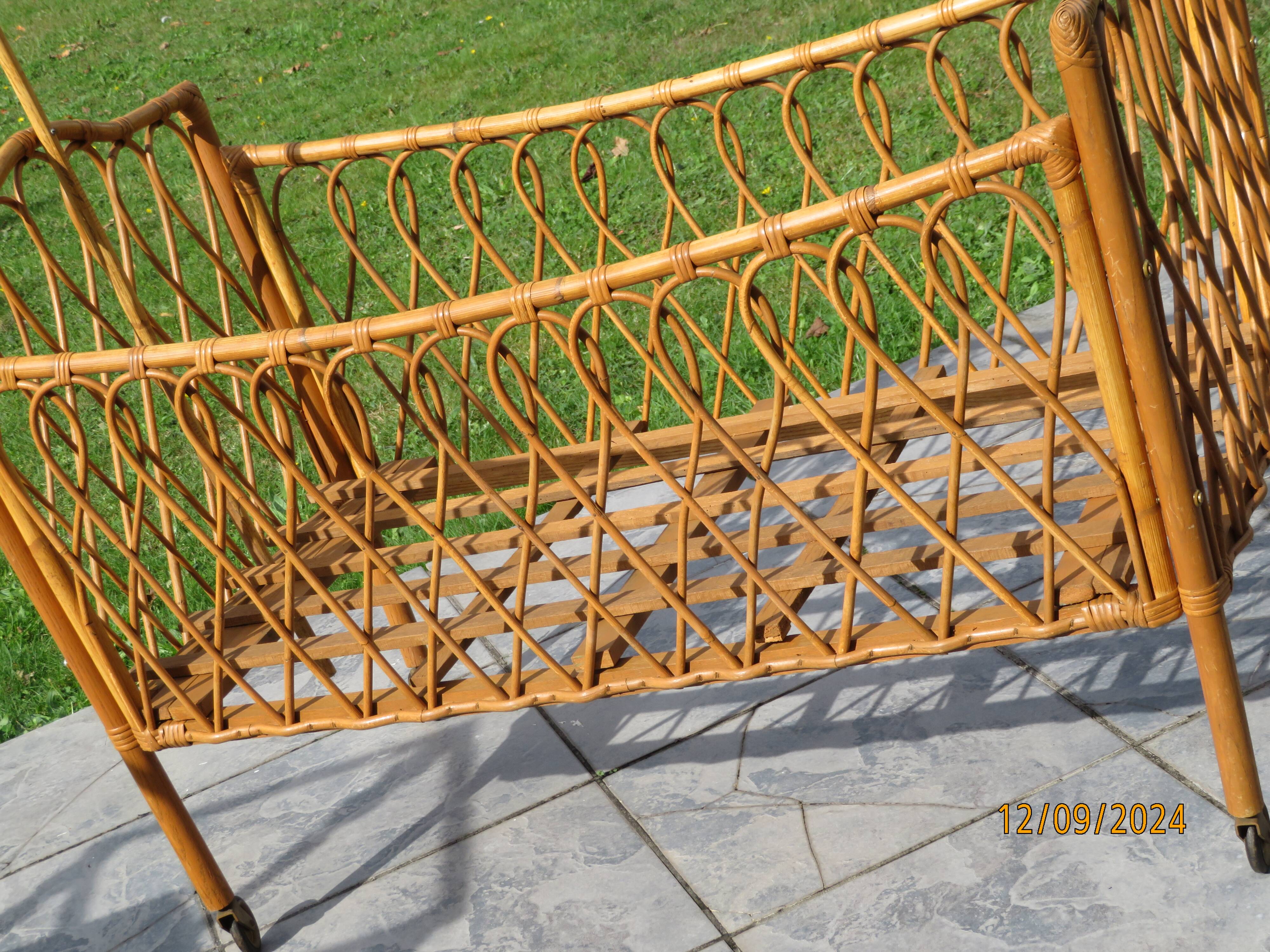 antique rattan children's bed with arrow