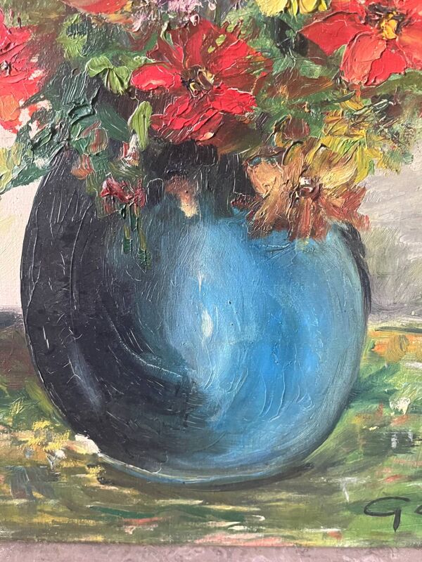 Bouquet de fleurs dans un vase bleu, signé