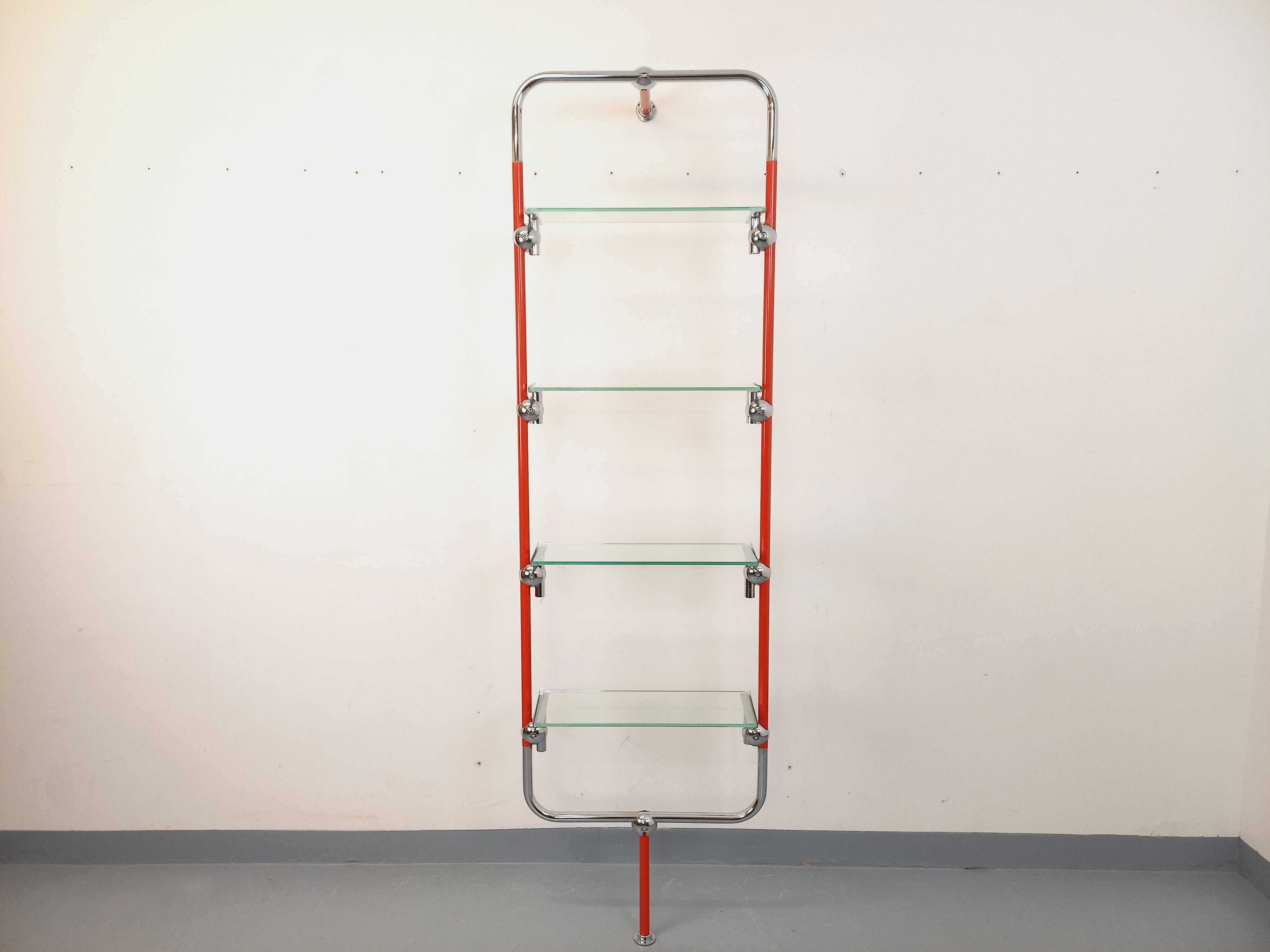 Modular bookshelf in vintage Bauhaus style, red metal, chrome.