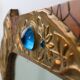 Miroir Art Nouveau en laiton et incrustation de verre, signé A.H. Villaket, France