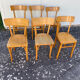 Set of 6 mismatched yellow bistro chairs