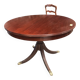 Round extendable dining table for six people, mahogany.
