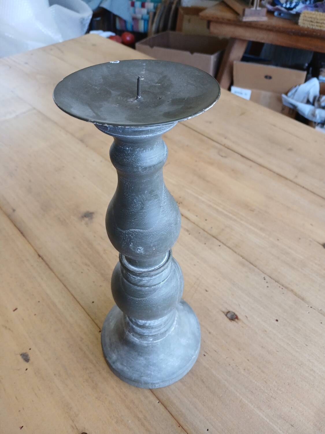 Candle holder in patinated wood