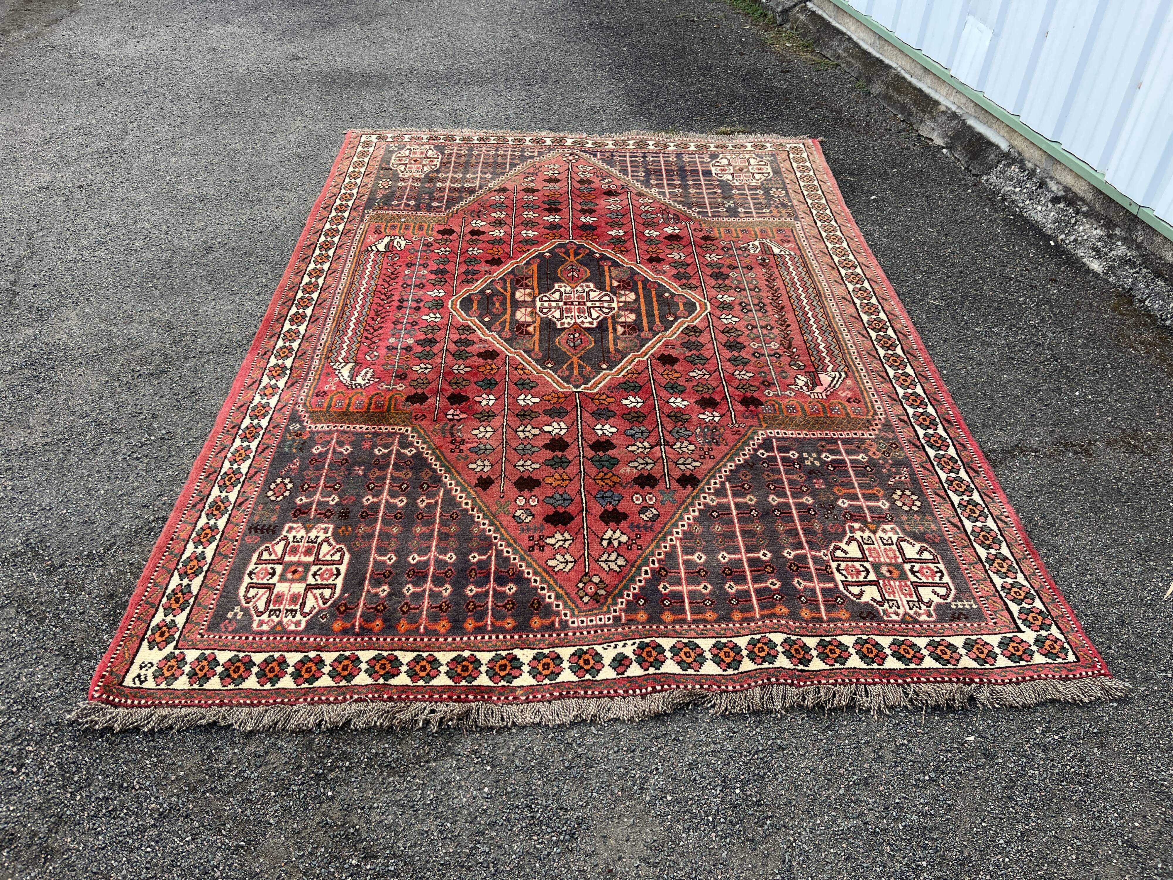 Large red Persian wool rug with red geometric design 2.97 x 2.05 m