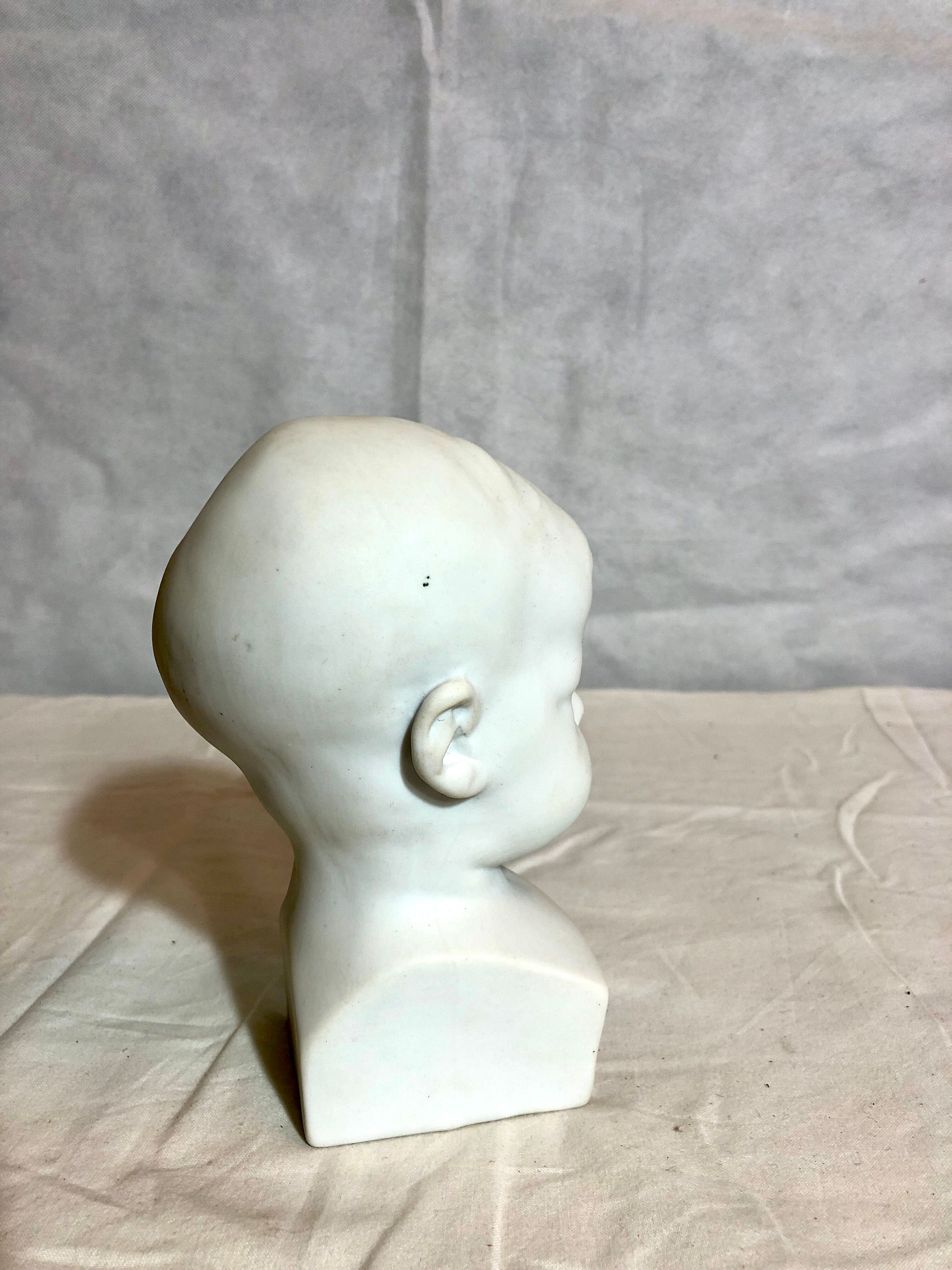 Tête d’enfant en biscuit, XXe siècle