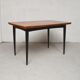Expandable rectangular dining table