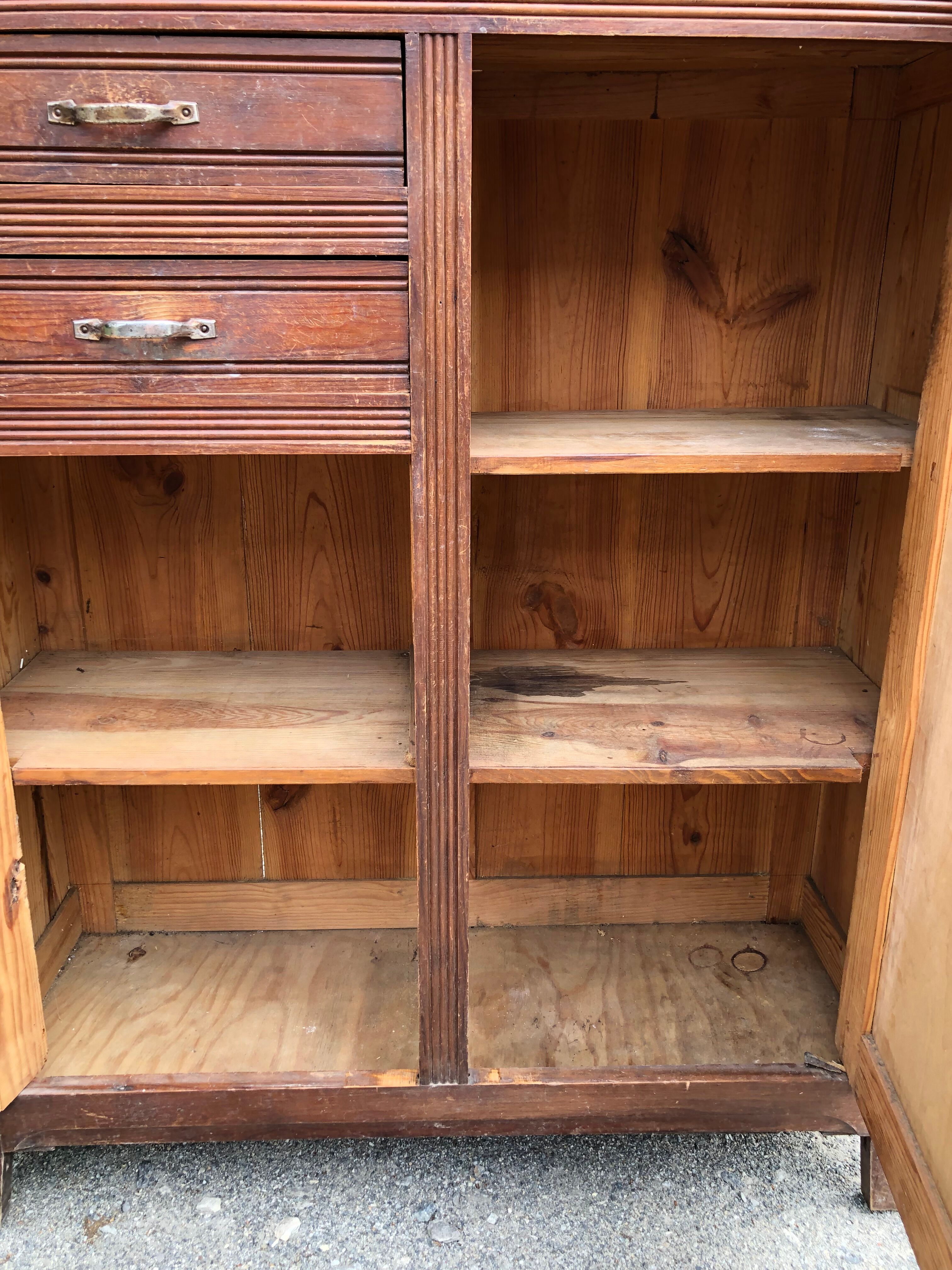 Vintage Parisian pine cabinet.