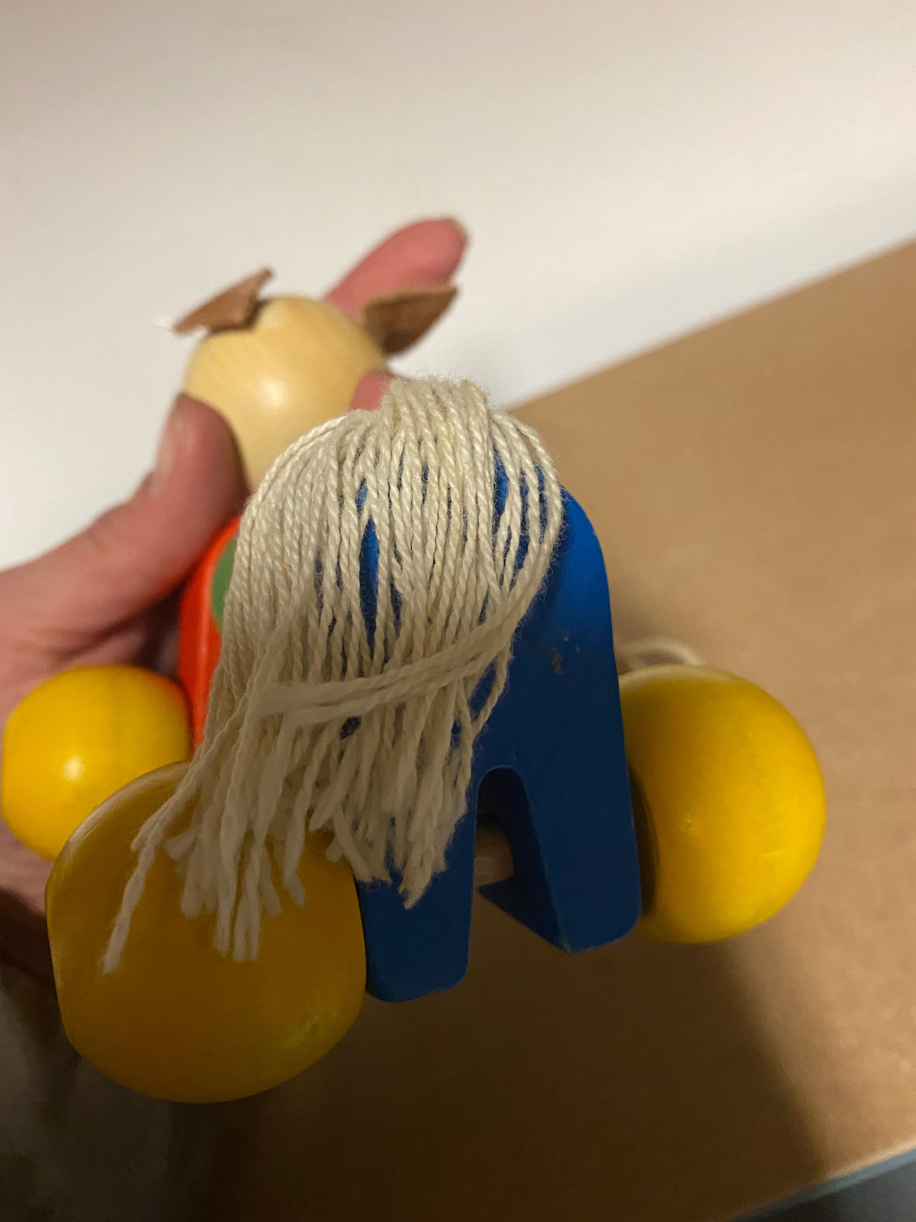 Old wooden toy to pull