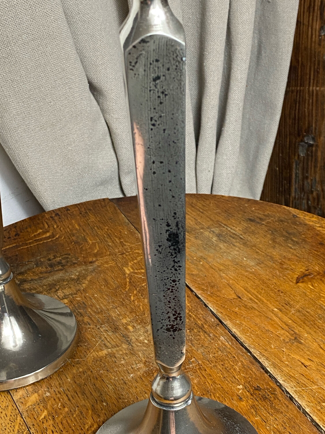Pair of silver-plated candlesticks