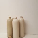 3 sandstone bottles