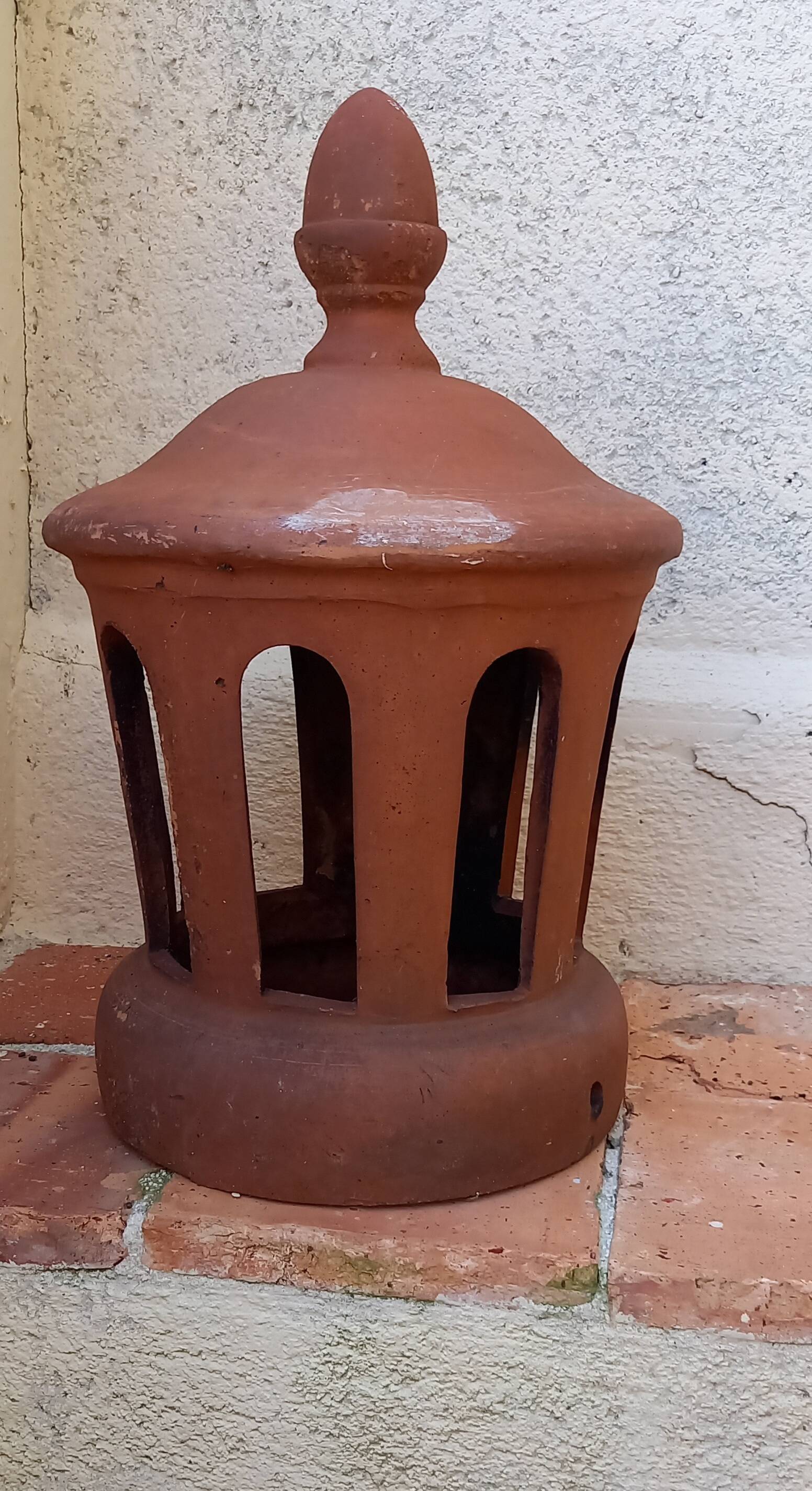 Chimney bolster and garden decoration roof