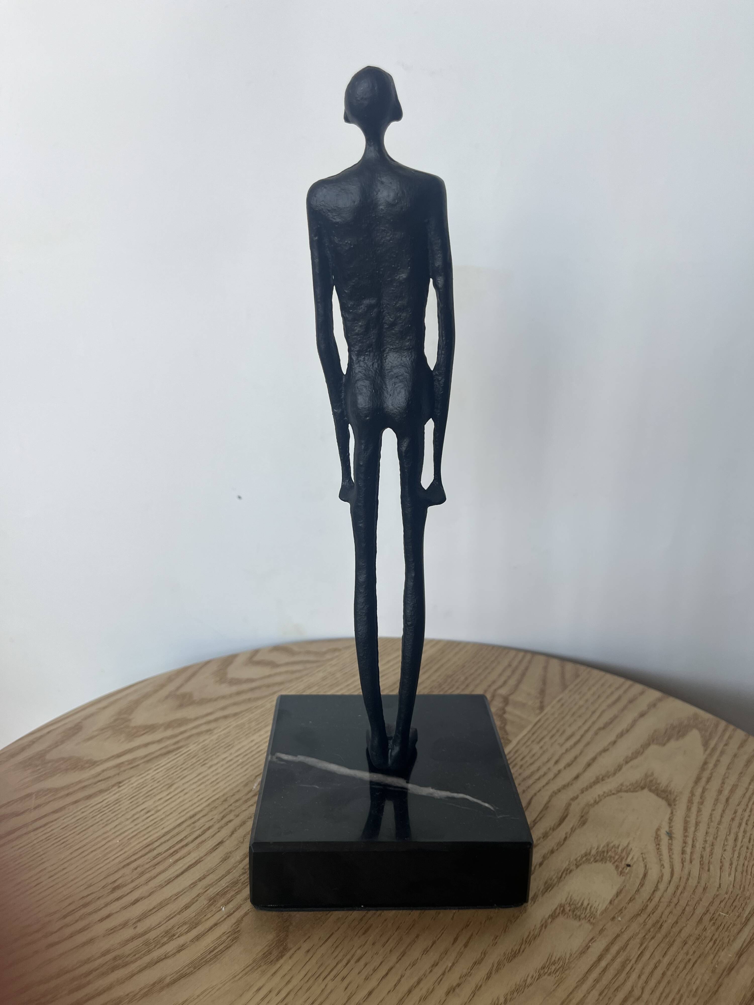 Standing Man by Giacometti