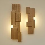 Pair of handcrafted modernist solid oak wall lights, circa 1980