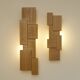 Pair of handcrafted modernist solid oak wall lights, circa 1980