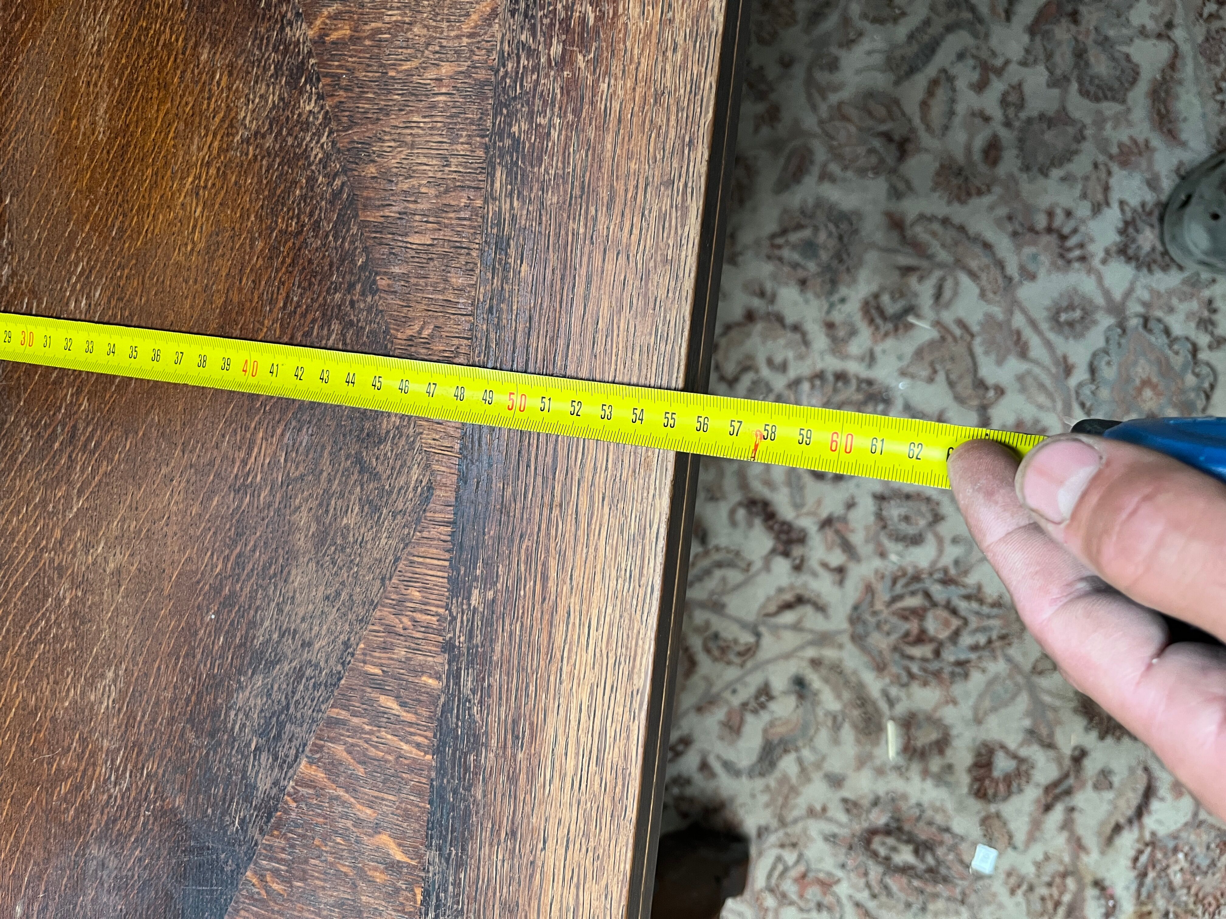 Spanish style table in carved wood and wrought iron