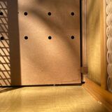 Vintage wooden and rattan baby cot from the 1960s.