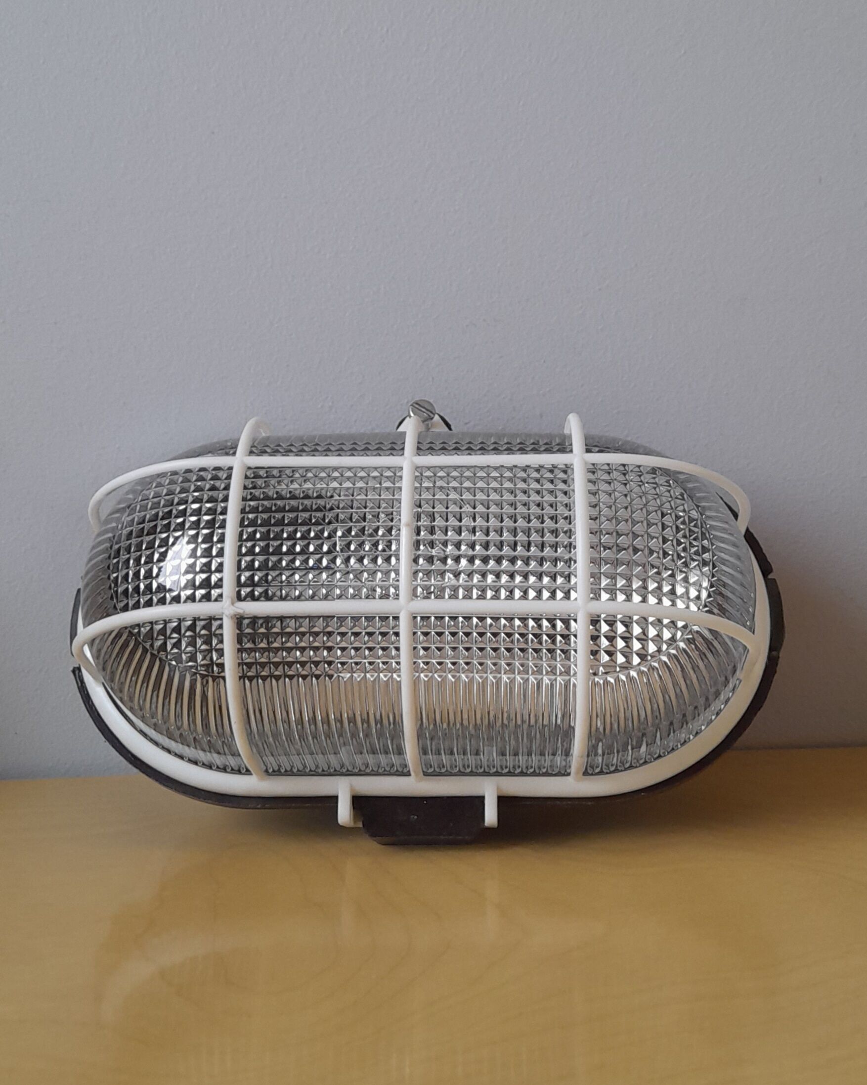 Ebonoid porthole lamp