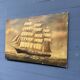 Large old oil painting of a ship