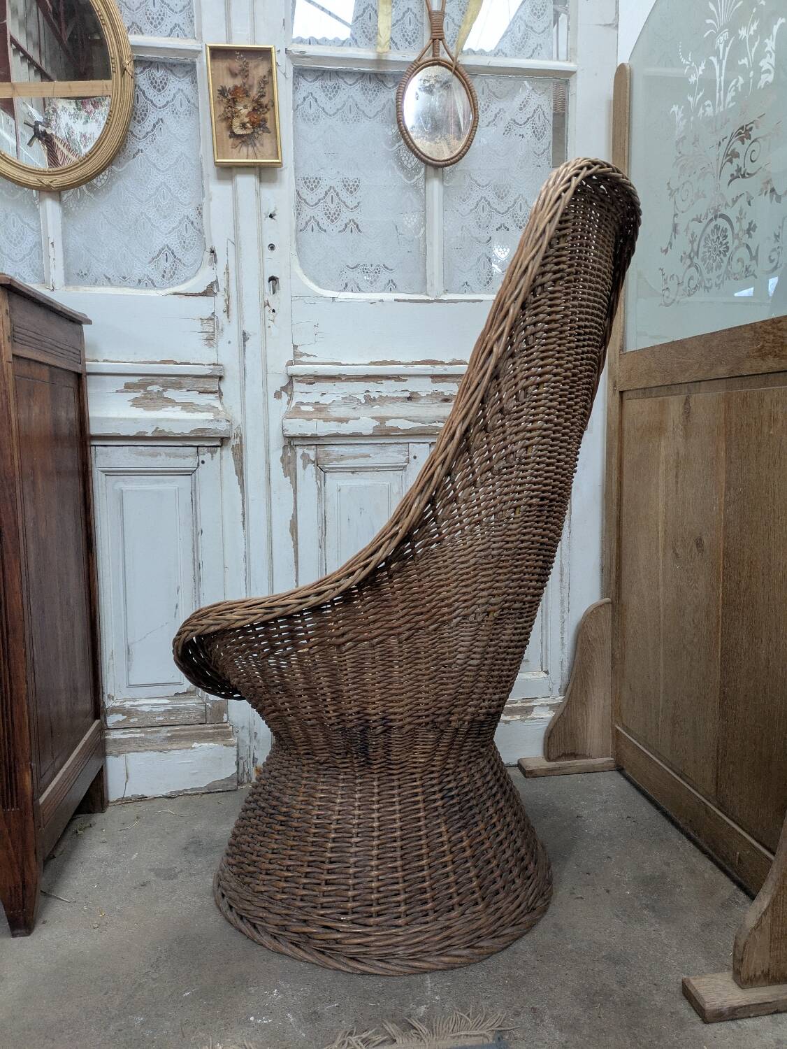 Large woven rattan armchair