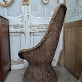 Large woven rattan armchair