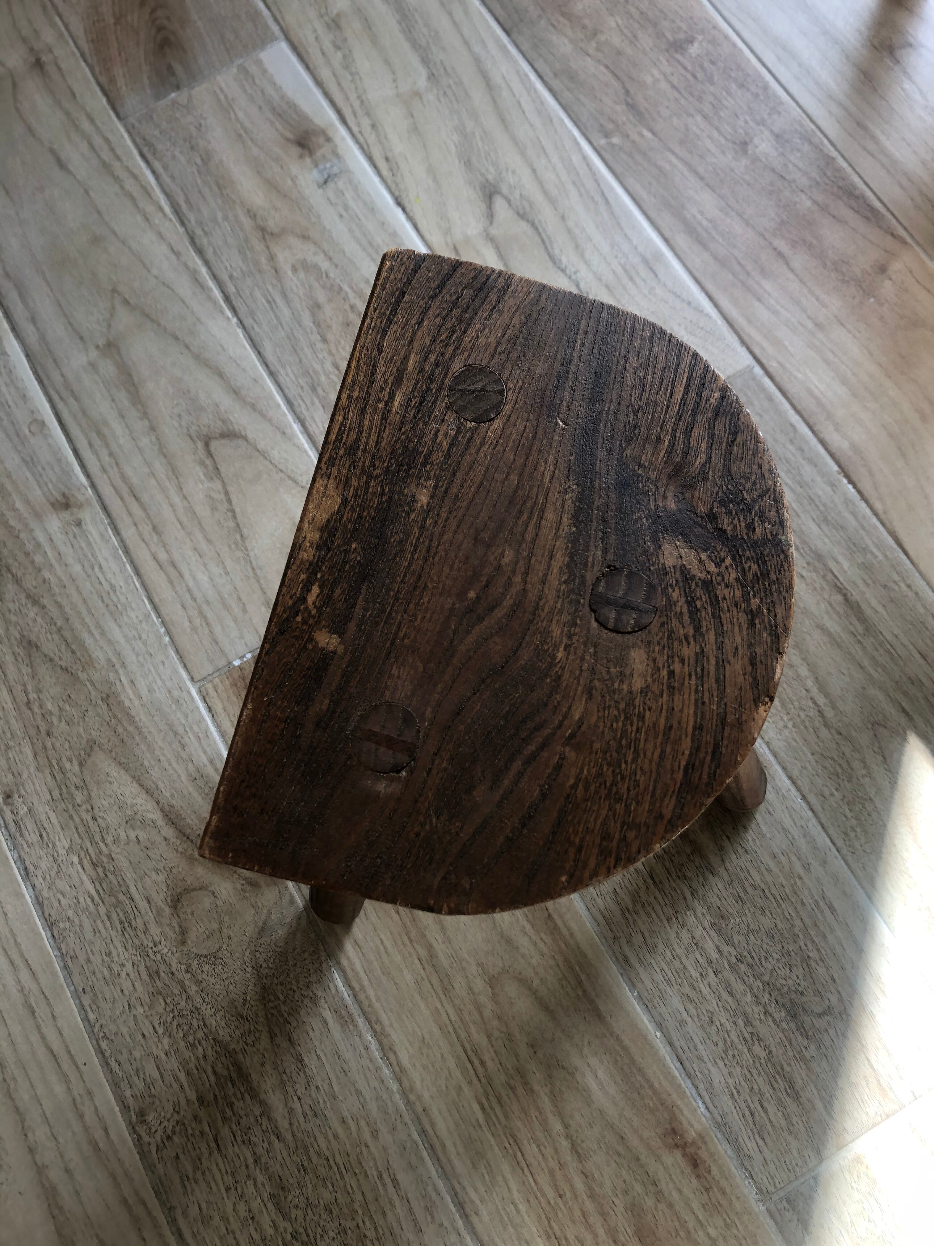 Wooden tripod stool