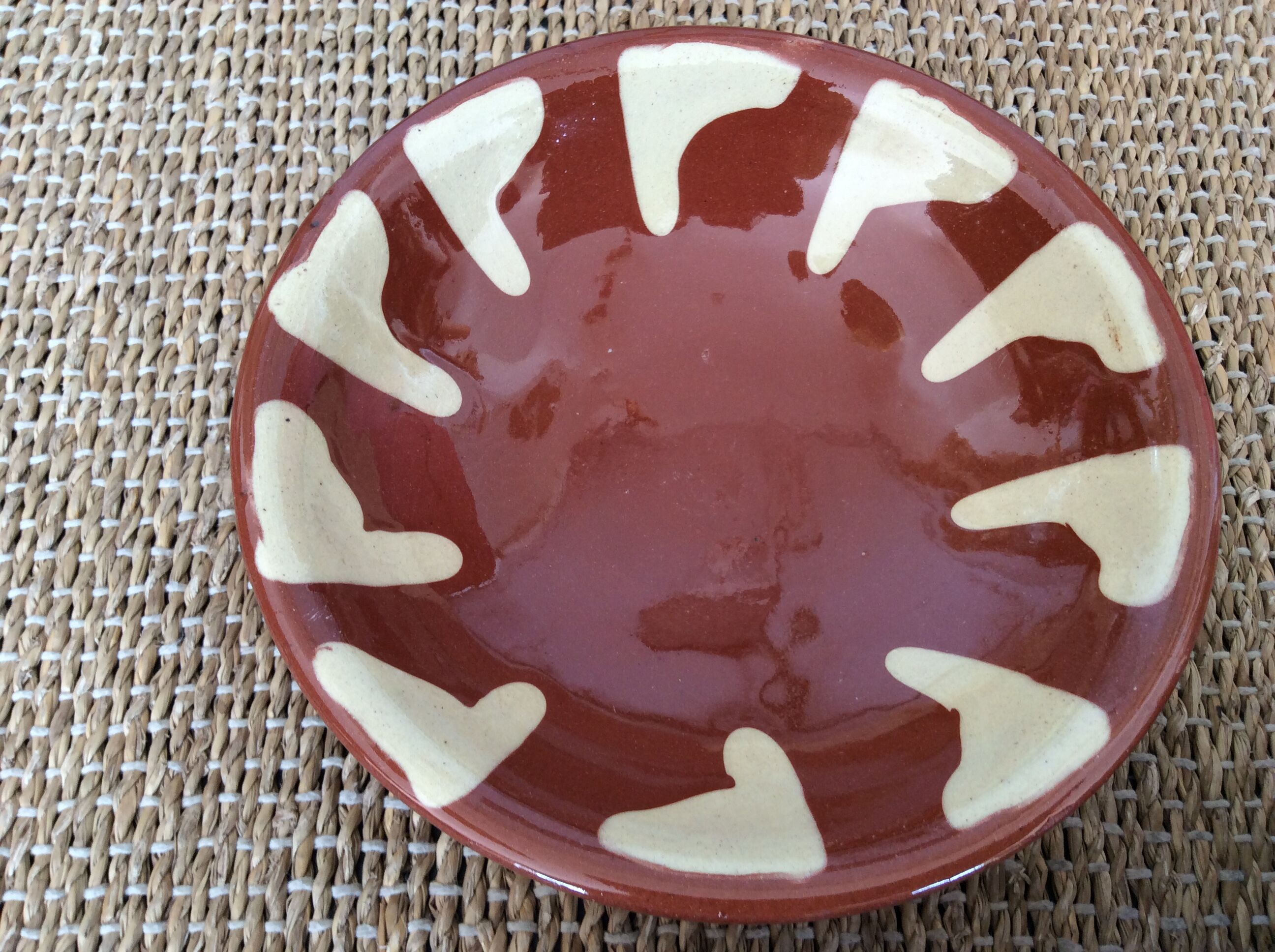 3 glazed terracotta plates