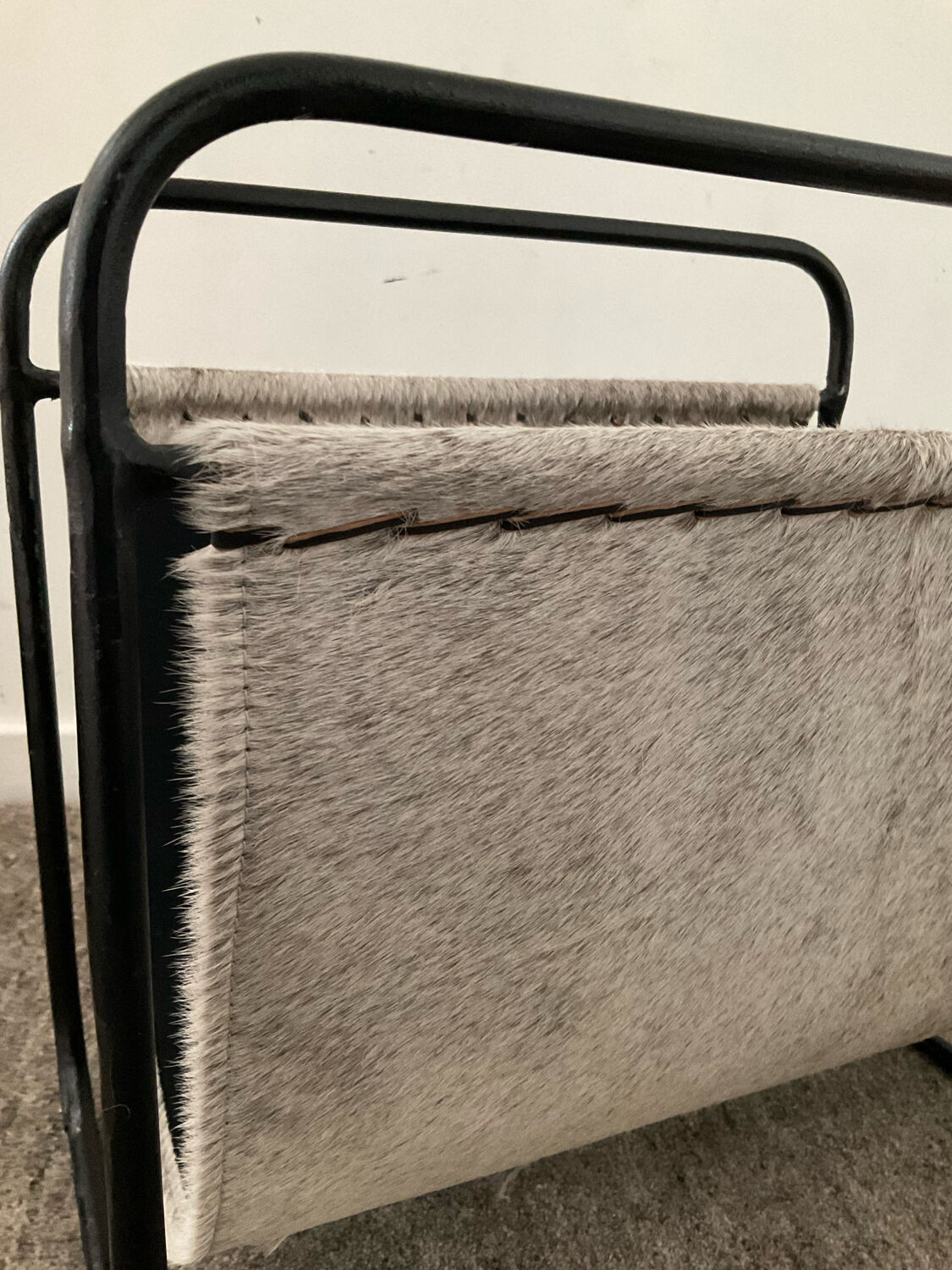 Vintage magazine holder in metal and leather
