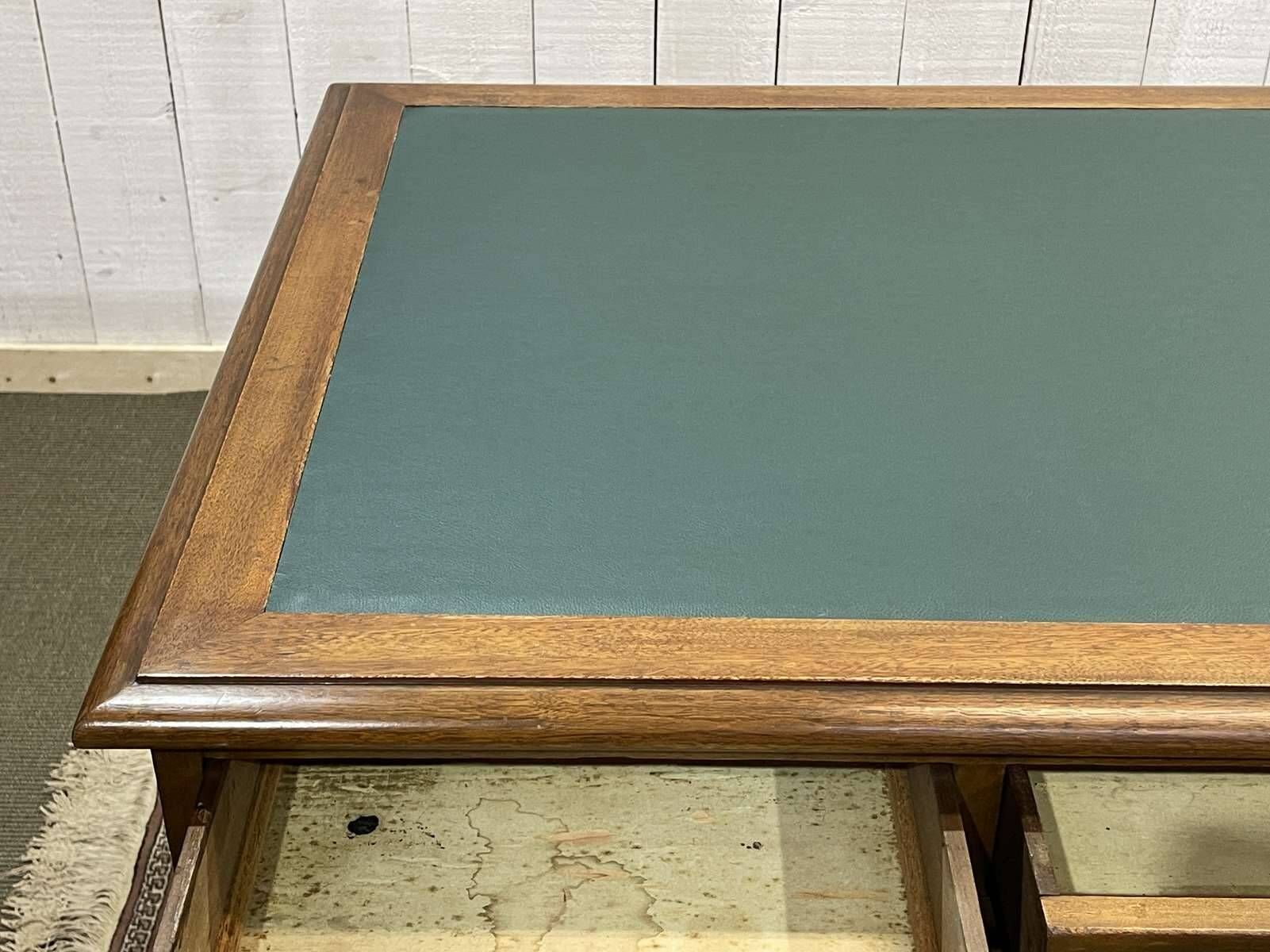 Late 19th century English mahogany desk with pedestals and leather top