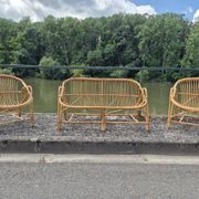 Rattan lounge with two armchairs and a vintage 1950s bench.
