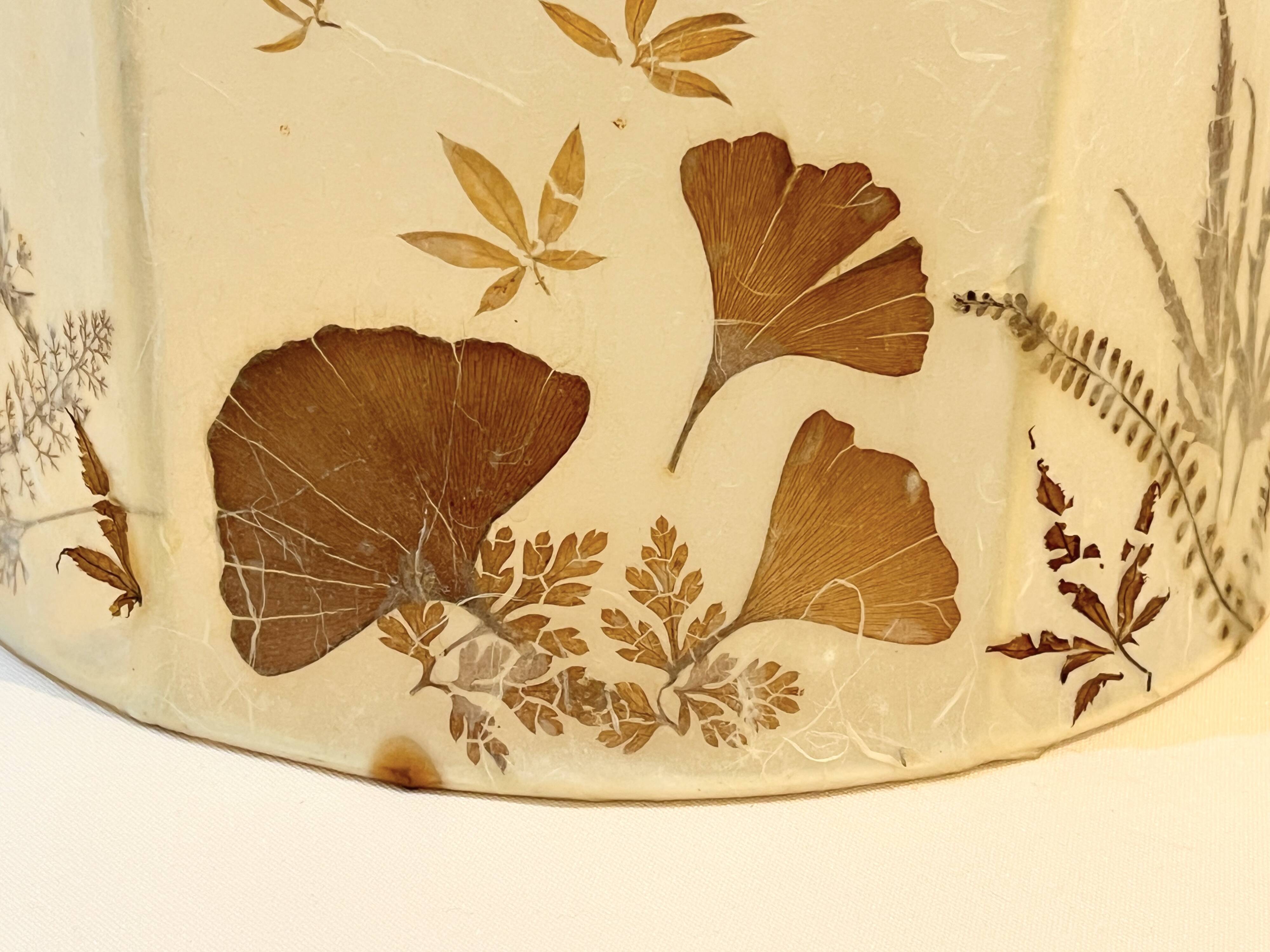 Vintage design lamp base in white ceramic with dried flower shade