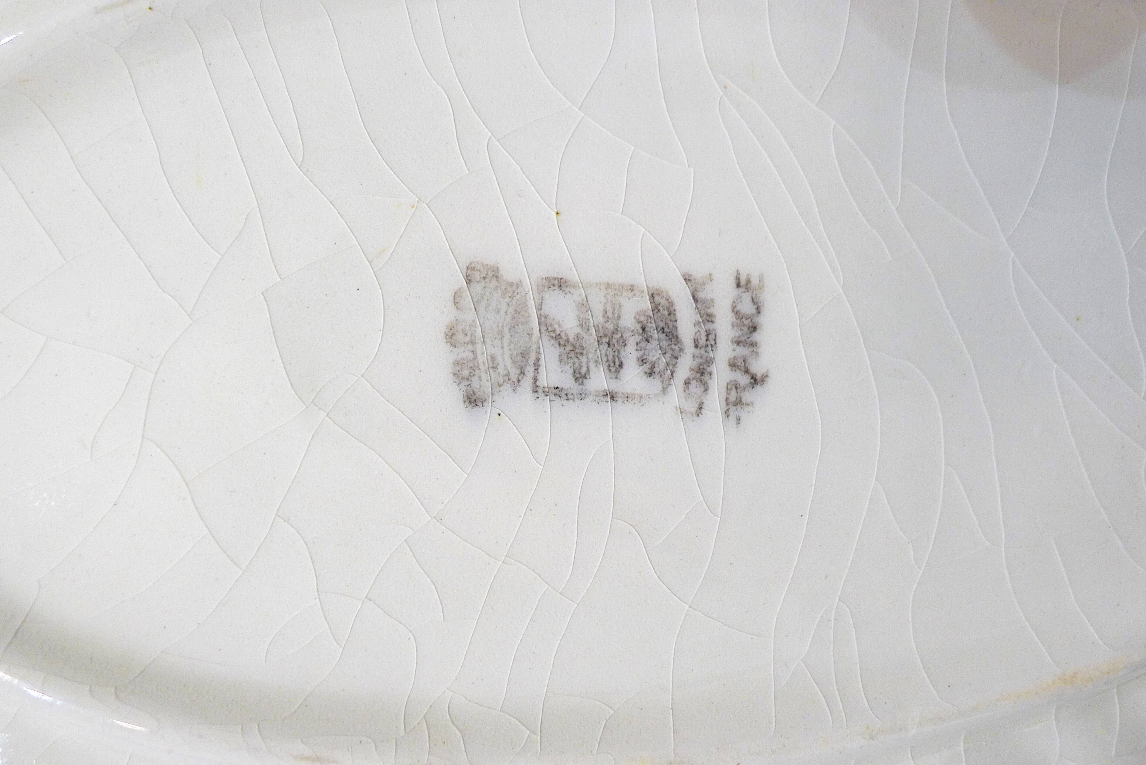 Fish dabbling sauce dish by Longwy