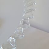 Serrated opaline suspension