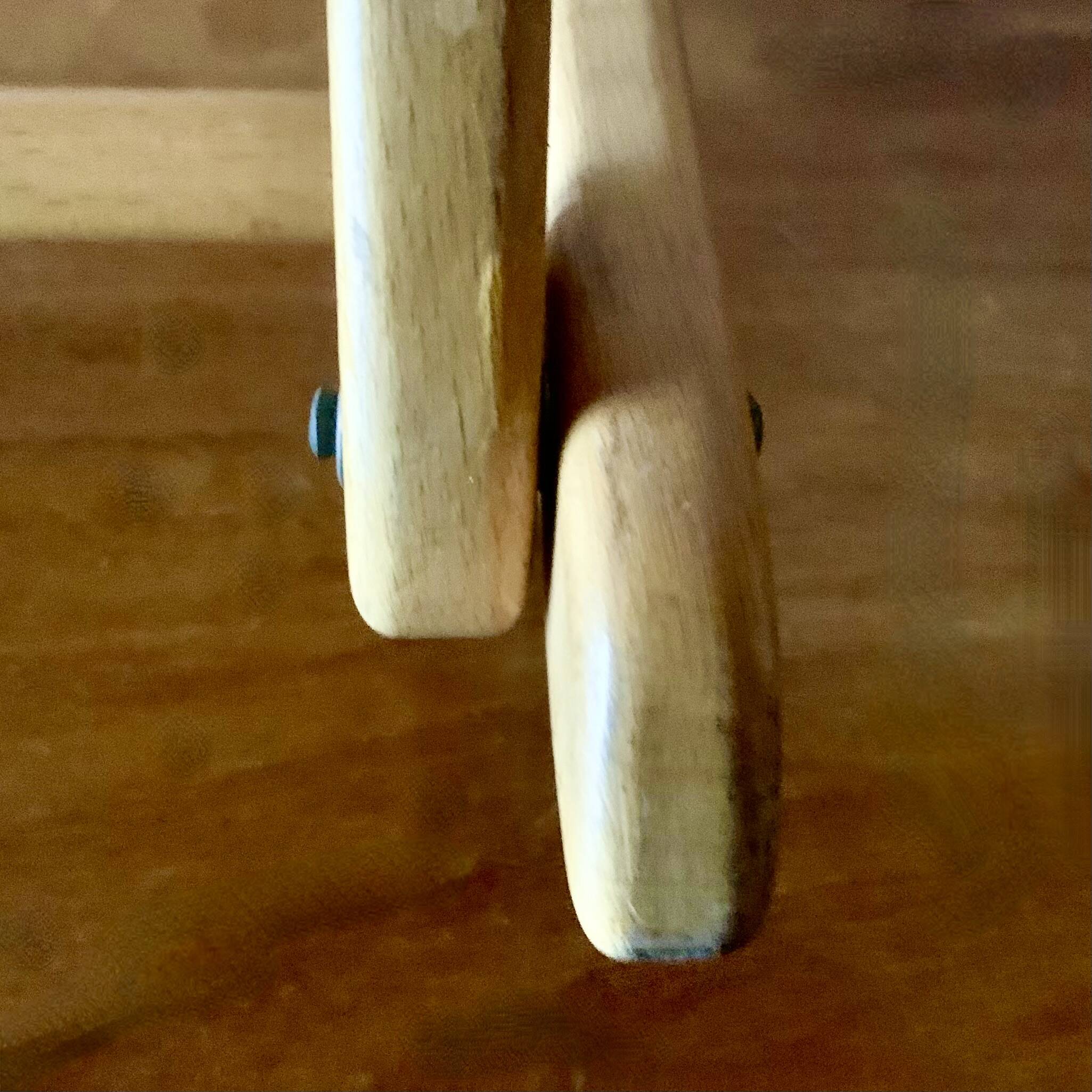 Vintage rocking footstool in red Skai and wood