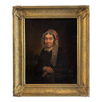 Late 19th century portrait representing a woman with a headdress and lace