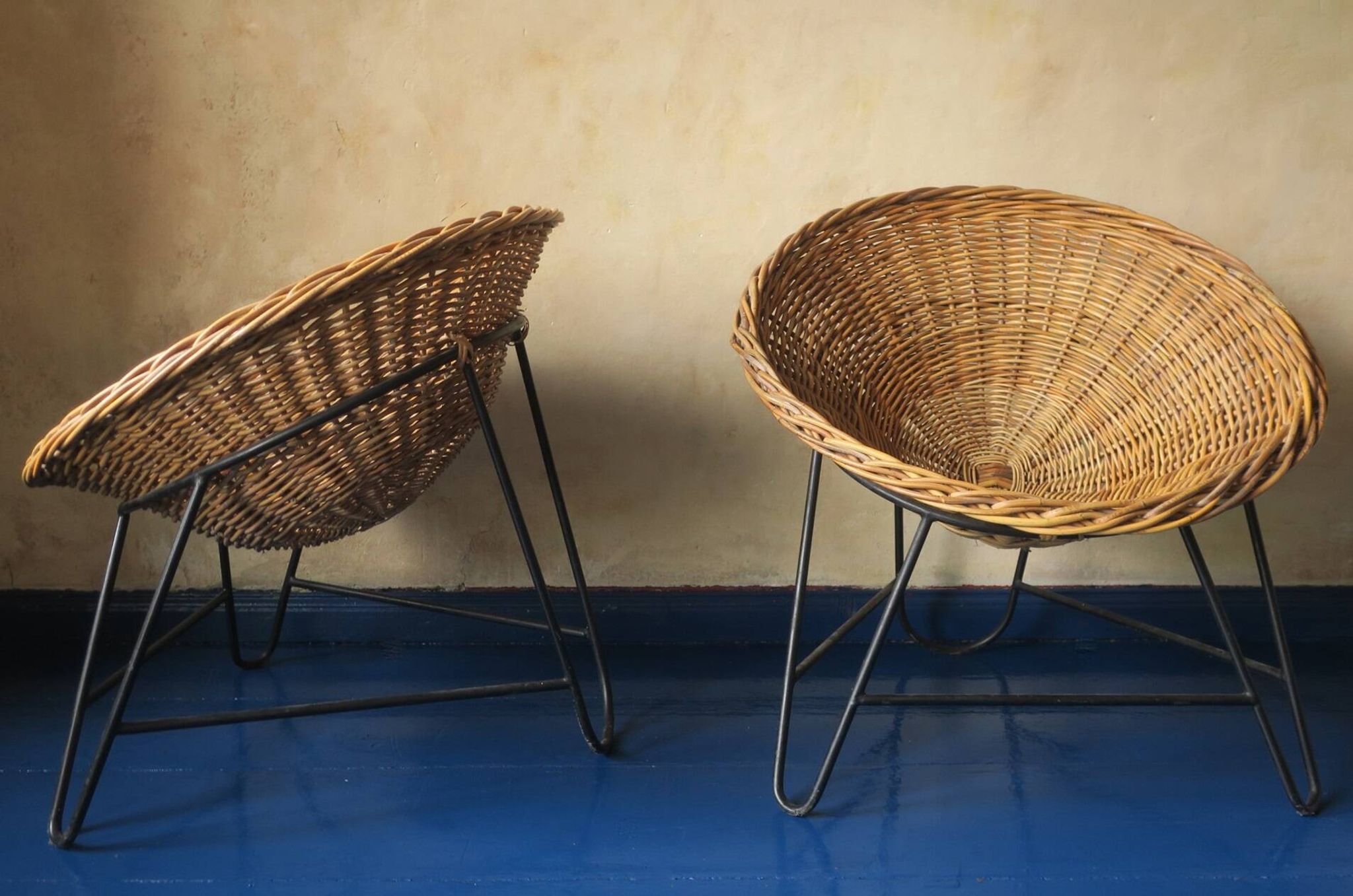 Pair of mid century bamboo and iron pod chairs, 1960s