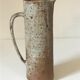 Pitcher in sandstone pyrity of the 60s
