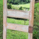 Mirror (3 panels) on door.